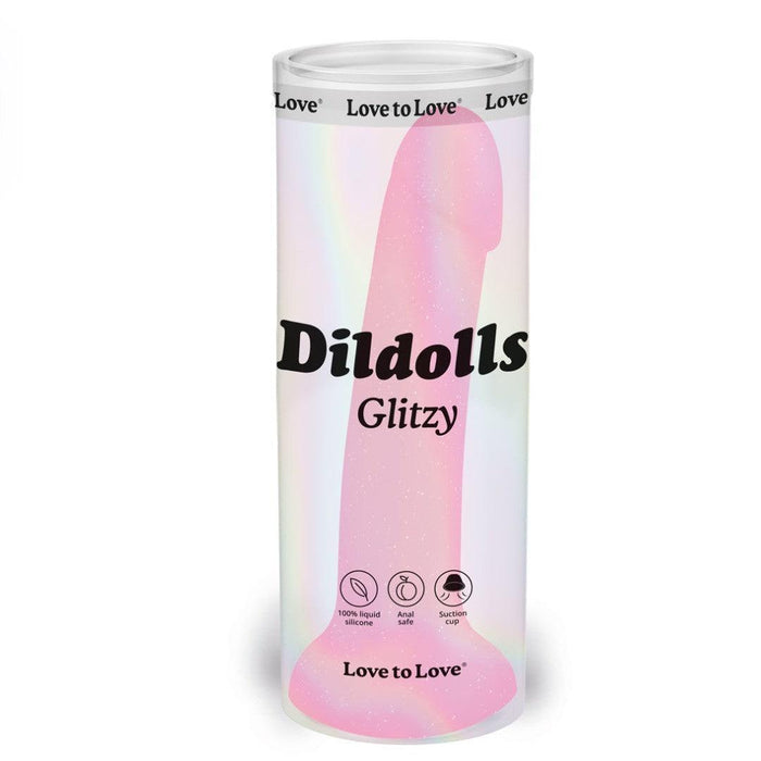 A cylindrical package for the Glitzy Smooth 7 inch Pink Sparkle Silicone Dildo with Suction Cup features a pink glitter dildo illustration, icons for liquid silicone, anal safe, and suction cup, plus "Love to Love" on an iridescent background.