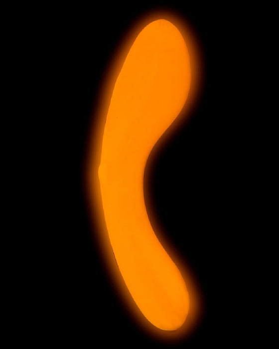 Mini Swan Glow in the Dark Double Ended Vibrator - Orange glowing on black background 