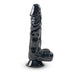 The Grille Large Ultra Realistic 8.5 Inch Silicone Dildo with Balls, in glossy black with prominent veins, suction cup base, and strap-on compatibility, stands upright against a plain white background.