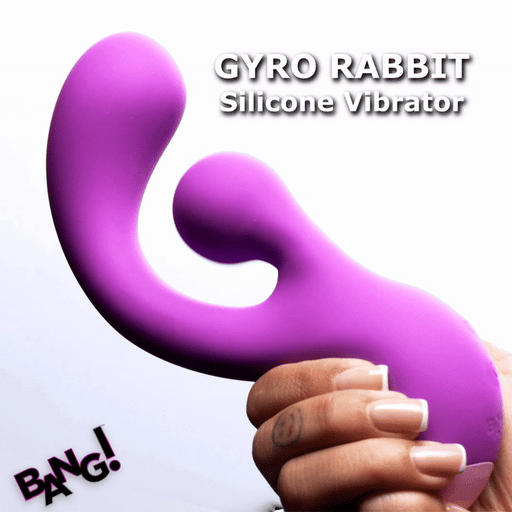 A hand holds the Gyro Rabbit Flexible Silicone Vibrator with Rotating Clitoral Stimulator, featuring two curved ends. Bold text reads "BANG!" at the bottom left, emphasizing its powerful dual stimulation design.
