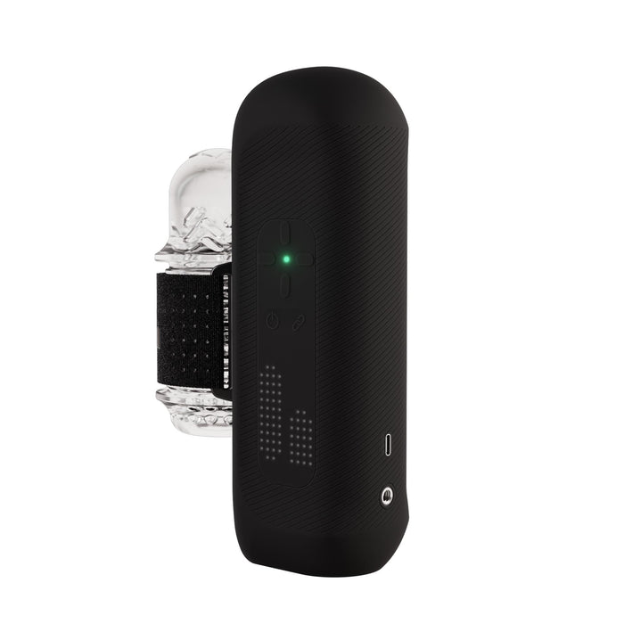 The Handy 2 Interactive Automatic Masturbator is a sleek black male sex toy with a textured surface, control buttons, LED indicator lights, charging port, and comes with a transparent curved accessory featuring a black band.
