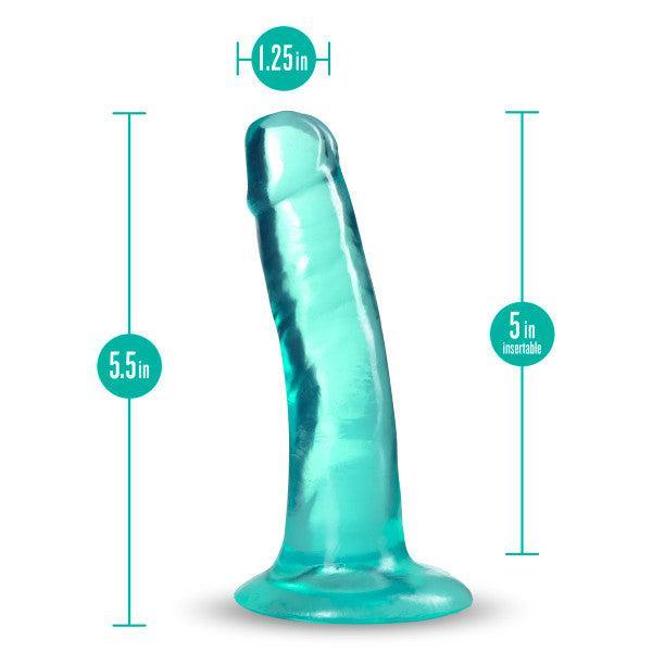 The Hard n' Happy Slim 5 inch Teal Mini Dildo features a translucent, upright design with a flared suction cup base for secure play. It measures 5.5" total length, 5" insertable, and 1.25" diameter, with measurement markers around the toy.