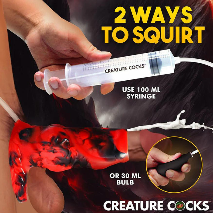 A hand holds a syringe above the Hell Hound Canine Squirting Penis Enhancer, squirting liquid. Text reads "2 ways to squirt: use 100 ml syringe or 30 ml bulb." Another hand squeezes a black bulb. Logo at bottom.