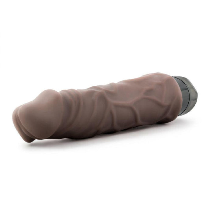 The Home Wrecker 9.5 Inch Vibrating Dildo - Chocolate is a large, realistic brown silicone dildo with veins and a rounded tip, shown on a white background. This waterproof toy delivers lifelike sensations for enhanced pleasure.