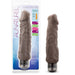 The Home Wrecker 9.5 Inch Vibrating Dildo - Chocolate is displayed in and out of its packaging, with features like its large size and waterproof design highlighted on the box.