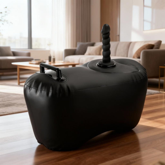 An Inflatable Love Seat Ride on Sex Cushion with Dildo Mount in black is placed on a wood floor.