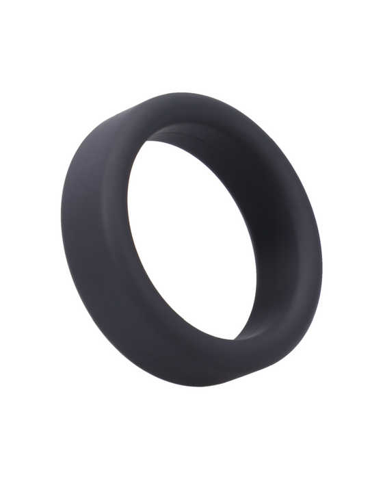 A simple black Tantus Super Soft 1.5 inch Cock Ring with a circular shape isolated on a white background.
