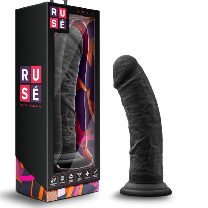 The Jammy Silicone Thick 8 Inch Black Silicone Dildo stands upright on its sturdy suction cup base next to its vibrant Ruse box, which features bold graphics and highlights the platinum cured silicone material.