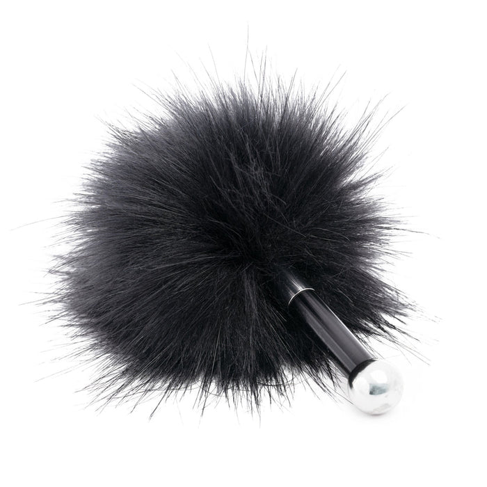 Fluffy black feather tickler with a sleek black handle and silver tip.