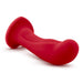 The Jezebel Sleek Curved 6 Inch Red Silicone G-Spot Dildo, featuring a curved design and flared suction cup base, is shown against a white background.