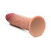 The Jock Dual Density Light Tone Silicone Thick 7 Inch Dildo with Suction Cup, featuring a realistic design with a pink tip, is shown lying on a white background.