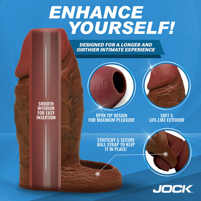 The Jock Girthy Open Ended Silicone Penis Sleeve in Chocolate features a soft, realistic exterior, smooth interior, stretchy ball strap, and open-ended tip—designed for extra length and girth during intimate moments.