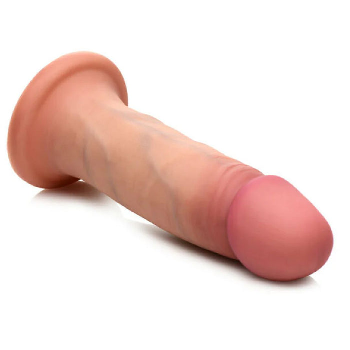The Jock Lifelike 6 Inch Dual Density Light Tone Silicone Beginner Dildo with Suction Cup - Vanilla features a realistic design, pronounced veins, and a harness-compatible base, shown on a white background.