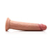 The Jock Real Skin Thick 8.5 Inch Medium Tone Silicone Suction Cup Dildo, featuring realistic veins and a pronounced head, is shown lying horizontally on a white background.