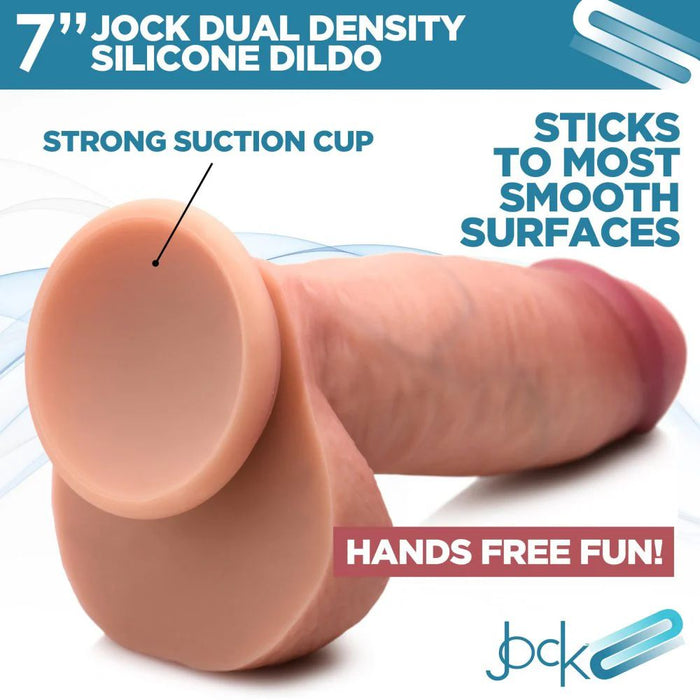 The Jock Realistic Dual Density Thick 7 Inch Silicone Dildo with Balls & Suction Cup offers lifelike feel, a strong grip, and hands-free play on smooth surfaces thanks to its dual density silicone and secure suction cup base.