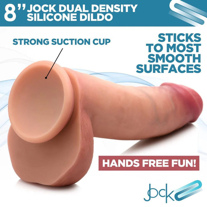 The Jock Realistic Dual Density Thick 8 Inch Light Tone Silicone Dildo with Balls & Suction Cup features lifelike texture and a strong suction base that sticks to most smooth surfaces, delivering hands-free pleasure and a true-to-life experience.