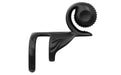 The Jovi Constant Contact Vibrating Couples Cock Ring with Remote is a sleek, abstract black sculpture featuring a swirling, curved design like a rolling ball. Its looped top and base resemble a stylized human figure profile, and its surface has subtle texture variations that add depth.