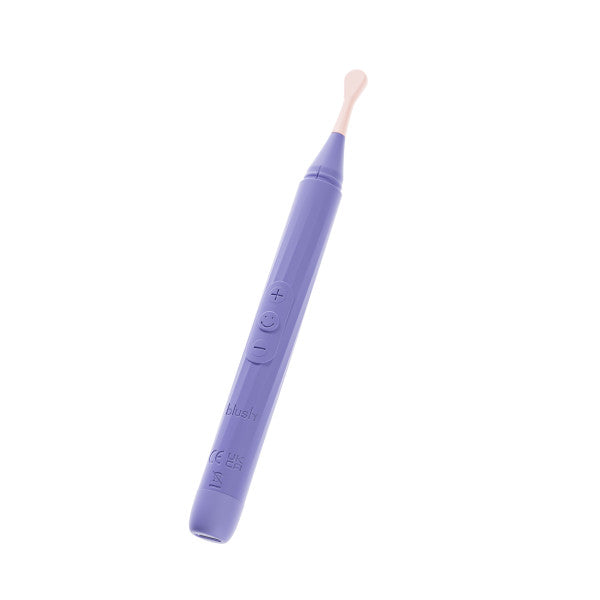 The Juno Precision Tip Oscillating Vibrator, shown with 3 attachment heads, features a purple handle with control buttons and a soft white silicone tip for precise ear cleaning, displayed against a white background.