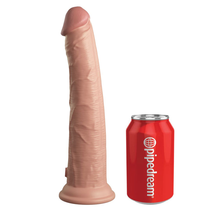The King Cock Elite Huge 10 Inch Dual Density Light Tone Silicone Dildo stands upright beside a red soda can for size comparison, showcasing its realistic look and feel thanks to dual density silicone construction.