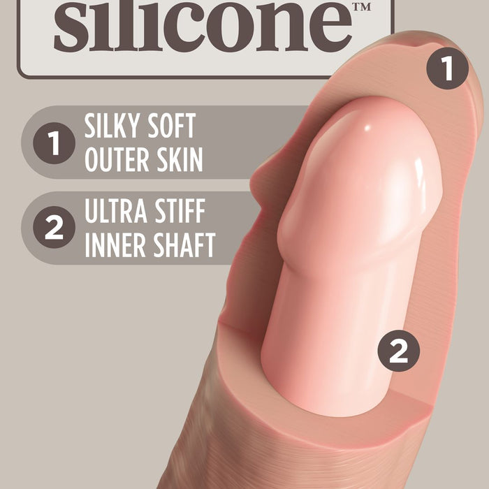 Cross-section of the King Cock Elite Huge Thick 11 Inch Dual Density Silicone Dildo shows two numbered layers: silky soft outer skin and ultra stiff inner shaft. Designed for lifelike feel, it's strap-on compatible and penis-shaped.