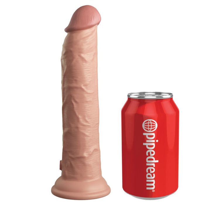 The King Cock Elite Long 9 Inch Dual Density Light Tone Silicone Dildo, featuring lifelike veins and a defined tip, stands upright beside a red "pipedream" soda can to show its size and realistic detail.