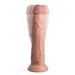 The King Cock Elite Long 9" Vibrating Dual Density Silicone Dildo with Remote features lifelike silicone, a pronounced head, textured surface, vibrating function, and a harness-compatible base with a control button for powered pleasure.
