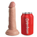 The King Cock Elite Realistic 6 Inch Dual Density Light Tone Silicone Dildo with a suction base stands upright beside a red "pipedream" soda can, offering a clear size comparison between the two realistic-looking objects.