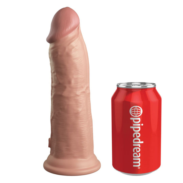The King Cock Elite Thick 8 Inch Dual Density Light Tone Silicone Dildo stands upright next to a red soda can labeled "pipedream" for size comparison, both displayed on a plain white background.