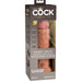 A boxed King Cock Elite Thick 8 Inch Vibrating Dual Density Medium Tone Silicone Dildo is visible through a clear front panel on the packaging.
