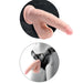 The King Cock Plus Swinging Balls Realistic 6 Inch Light Tone Dildo, shown with a strong suction cup base on a wall and in a harness on a mannequin, is perfect for hands-free or strap-on play.
