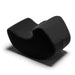 A modern, black Liberator Pulse – Ergonomic Straddling Toy Mount with a smooth crescent shape and minimalist design, reminiscent of foam rocking chairs, is photographed on a white background.