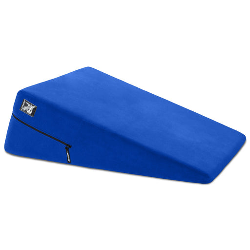 The Liberator Ramp – Intimate Positioning Support Cushion 24 Inches, shown in blue with a zippered cover, offers support, elevation, and enhanced intimacy on a white background.