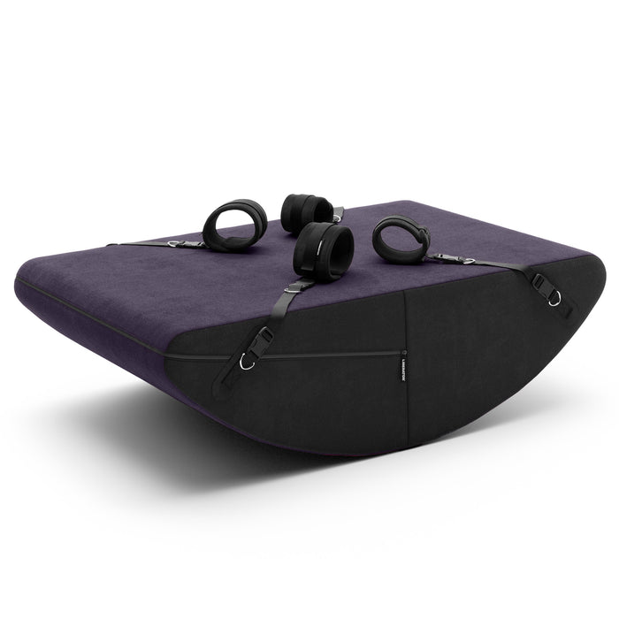 Purple velvet Liberator Scoop Rocker with black side panels and four adjustable restraint cuffs on a white background.