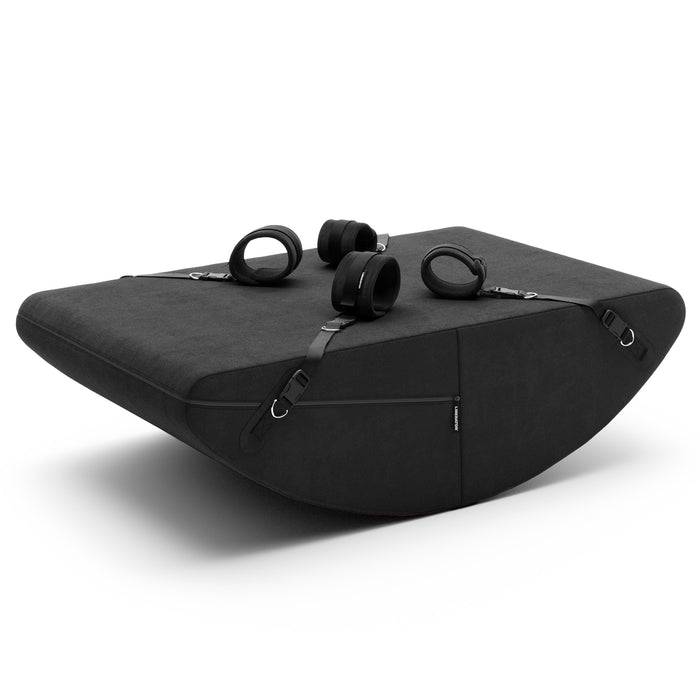 Black Liberator Scoop Rocker positioning cushion with soft micro-velvet fabric and four adjustable restraint cuffs.