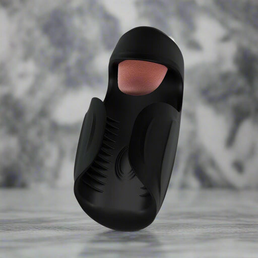 The Lickety Split Rechargeable Vibrating Thumping Stroker Silicone by Blush is a sophisticated black silicone sleeve crafted for ultimate pleasure. It showcases an open-ended design with a textured inner lining and multiple vibrating speeds, delivering ergonomic enhancements for personalized sensations.