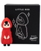 A collectible figurine of a character styled in a red cloak with matching hood, named "Little Red First Time Discreet Powerful Bullet Vibrator," displayed in front of its packaging which is adorned with a simplistic white illustration of the character and by Natalie's Toy Box.