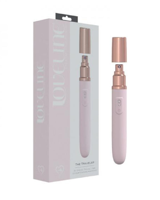 The Traveler Vibrator and Lube Set - Pink  next to box 