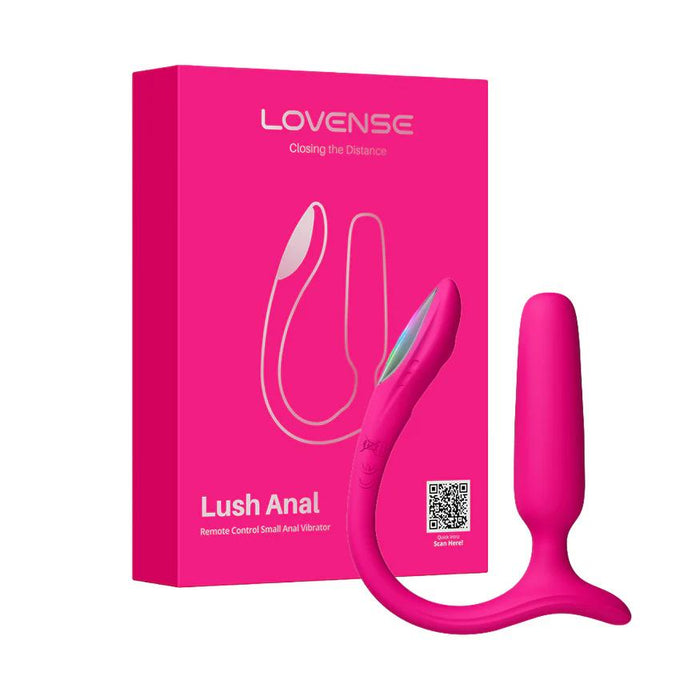 A Lovense Bluetooth App Controlled Vibrating Anal Plug in pink is shown beside its vibrant packaging, which displays an illustration of the product and the Lovense brand name.