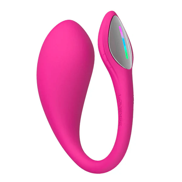 The Lovense Lush 4 Sound Activated Bluetooth Wearable Vibrator features a bright pink, flexible, curved design with a smooth surface, metallic accent, and LED light—perfect for G-spot stimulation and discreet wear.
