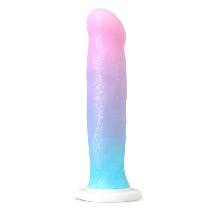 The Lucky Sparkle Lightly Textured 8 Inch Silicone Suction Cup Dildo features a pastel gradient in pink, purple, and blue on body-safe silicone. Its sturdy white suction cup allows upright use for versatile pleasure and striking visual appeal.