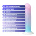 The Lucky Sparkle Lightly Textured 8 Inch Silicone Suction Cup Dildo, featuring a gradient pastel rainbow design and white suction base, is shown with features like platinum-cured silicone, smooth finish, handcrafted body-safe materials, and latex/phthalate-free.