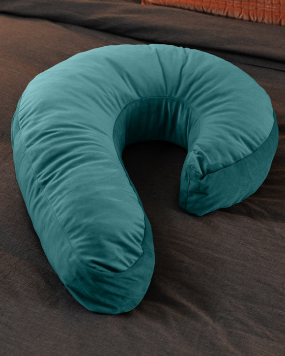 Liberator Lune Toy Mount Sex  Pillow - Teal on brown bed 