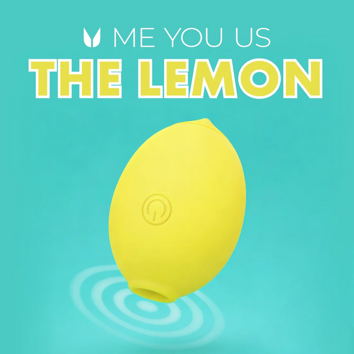 A yellow, lemon-shaped object with a power button symbol floats above blue ripples on turquoise, suggesting clitoral pleasure. Bold text above reads "ME YOU US THE LEMON Powerful Clitoral Air Pulsation Suction Vibrator.