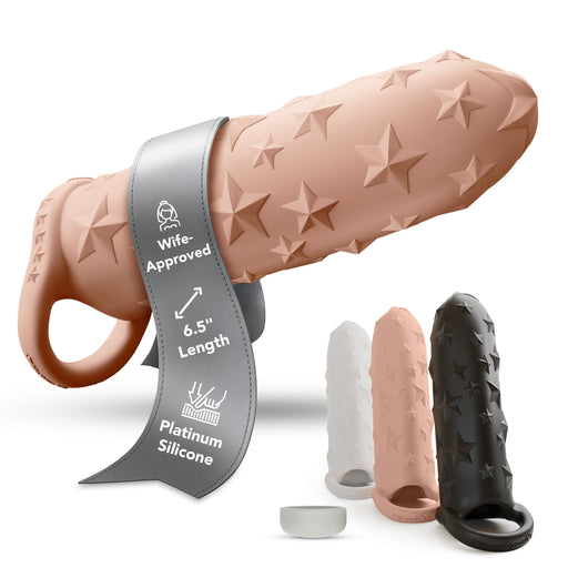 The Star Studded Silicone Penis Extender - 6.5 Inch Closed Ended comes in white, pink, and black with star patterns and a removable ring. The pink sleeve’s ribbon reads “Wife-Approved,” “6.5” Length,” “Platinum Silicone” for premium sensation.