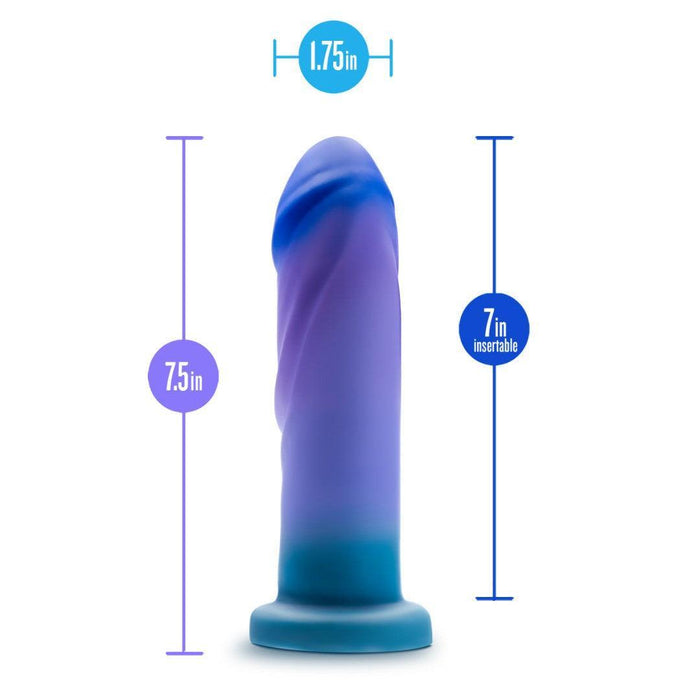The Midnight Rendezvous Textured 7.5 Inch Girthy Dildo is a blue and purple, medium-sized silicone toy with a flared base, harness compatibility, 7.5" height, 1.75" width, and 7" insertable length.