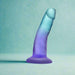 The Morning Dew Slim Small 5 Inch Blue Dildo with Suction Cup stands upright against a light blue textured background, making it an ideal beginner-friendly option for those new to exploration.