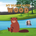 A cartoon beaver by a river with trees and hills is featured on "My Beaver Hates Wood" Adult Humor Book by Jen Jenivive. This cheeky design makes a perfect novelty gift, complete with a small circular image of the author.