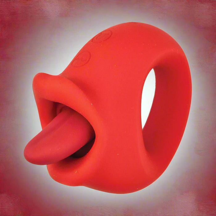 The My Secret Vibrating Tongue with Finger Loop - Red is a silicone vibrator featuring a tongue-like design and small opening, displayed on a gradient pink and white background.