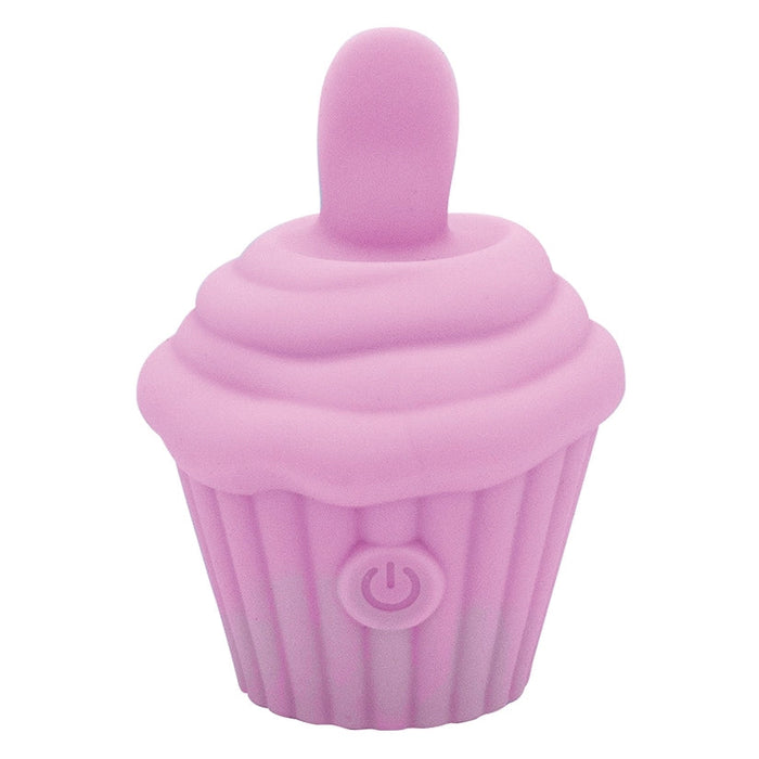 The Cake Eater Clitoral Stimulator Tongue Vibrator in pink is a small, silicone cupcake-shaped sex toy featuring a rounded tip for clitoral stimulation and a front power button symbol.