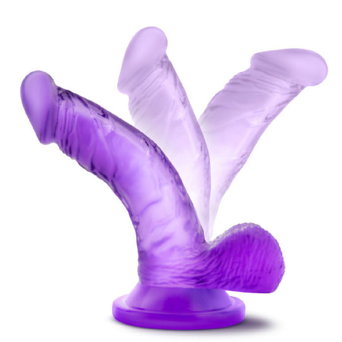 The Naturally Yours Small Realistic 4 Inch Purple Mini Dildo is a translucent, double-ended dildo with realistic details and a suction cup base—ideal as a beginner strap-on or mini cock for versatile pleasure and flexible use.